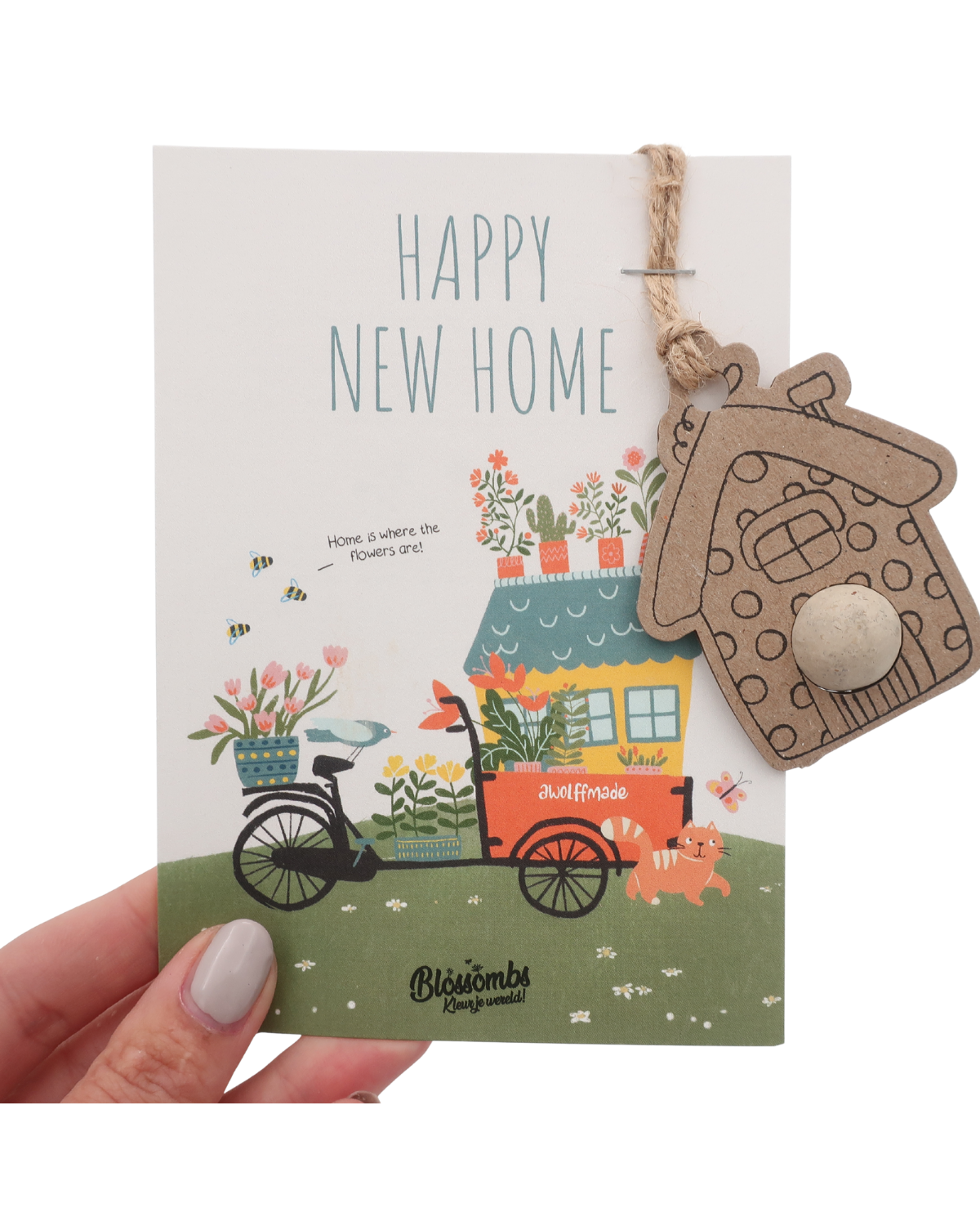 Handgemaakte kaart van Blossombs met huis-hanger en biologisch zaadbommetje, perfect als duurzaam en creatief housewarming cadeau voor iemand met een nieuw huis.